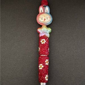 Red Rhinestone pen with Labubu decorative shiny accent